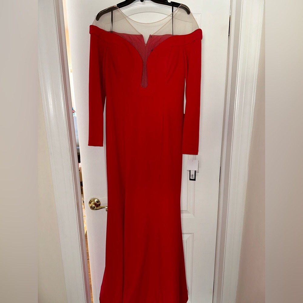 Brand new red dress with sheer mesh in a size 16 from Xscape.